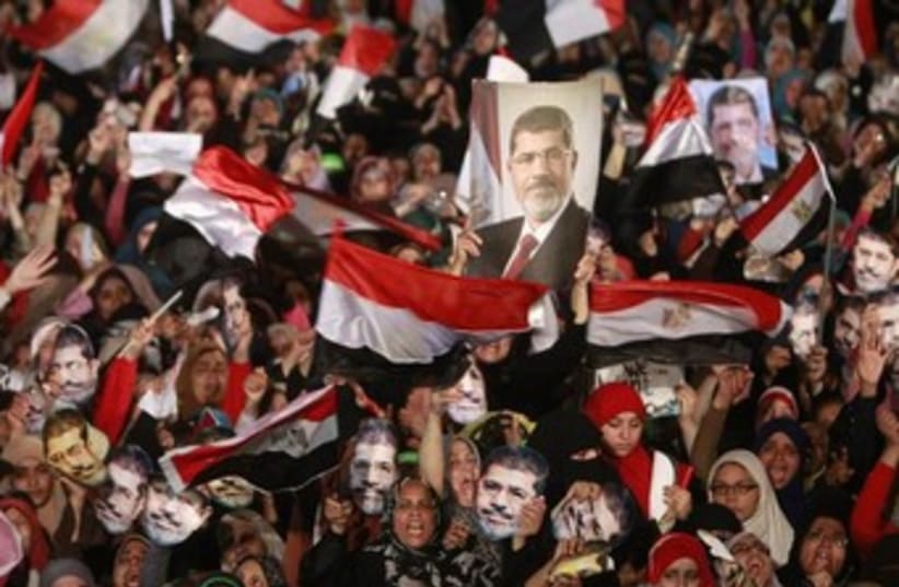Morsi supporters demonstrate 370 (photo credit: REUTERS)