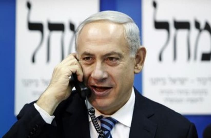 netanyahu makes phone call 370 (photo credit: REUTERS)