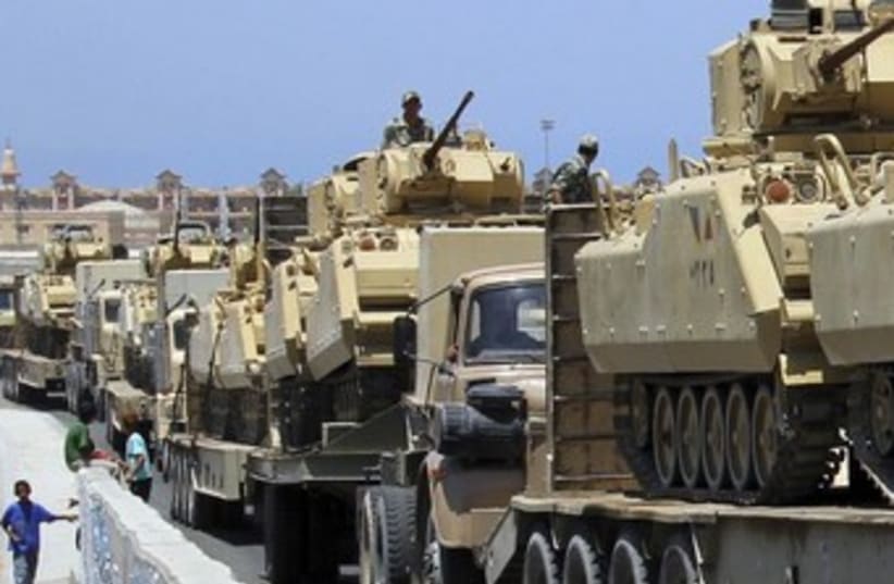 Egyptian army tanks en route to Rafah 370 (photo credit: REUTERS/Mohamed Abd El Ghany)