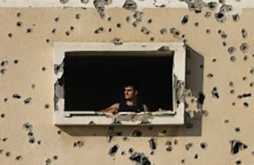 Gaza bullet-riddled home (photo credit: AP)