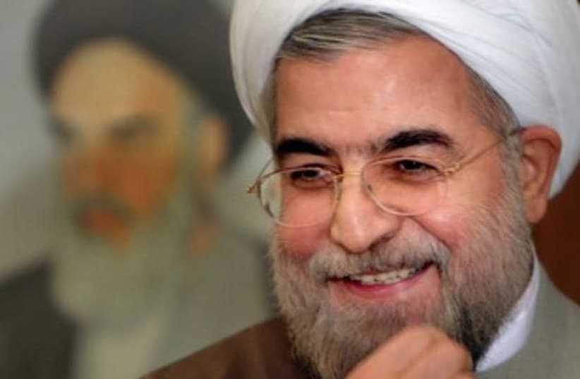 Hassan Rouhani lauging370 (photo credit: REUTERS/Raheb Homavandi)