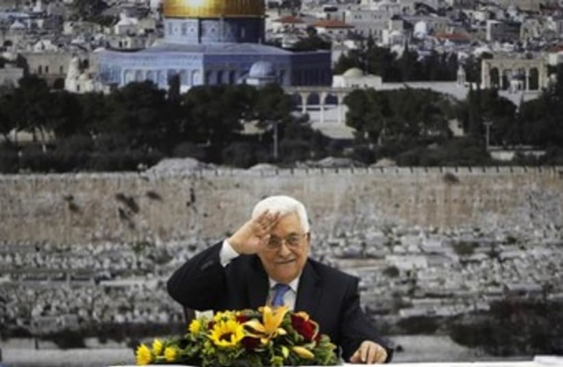 Abbas with a Jerusalem background 370 (photo credit: REUTERS/Mohamad Torokman)
