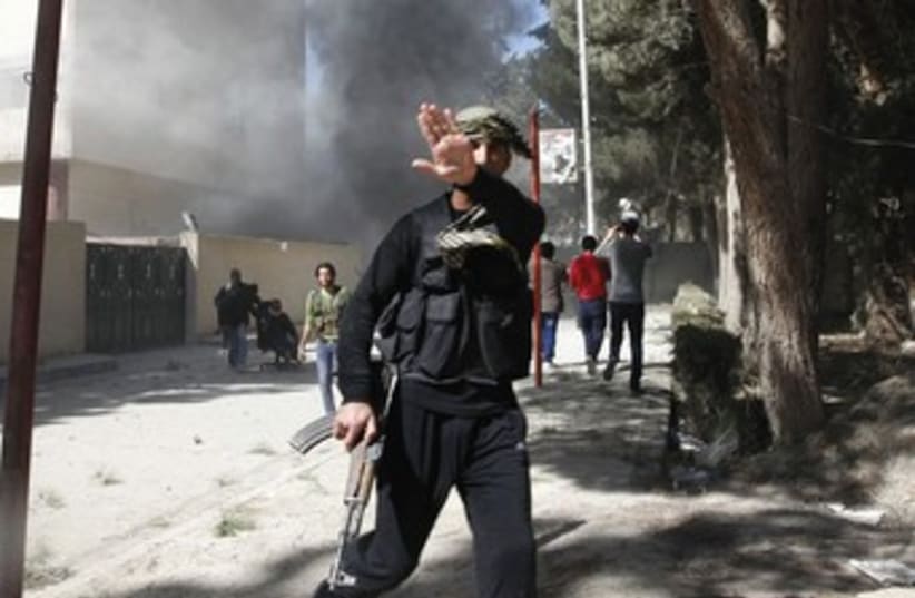 Jabhat al-Nusra figter, Syria370 (photo credit: Reuters)