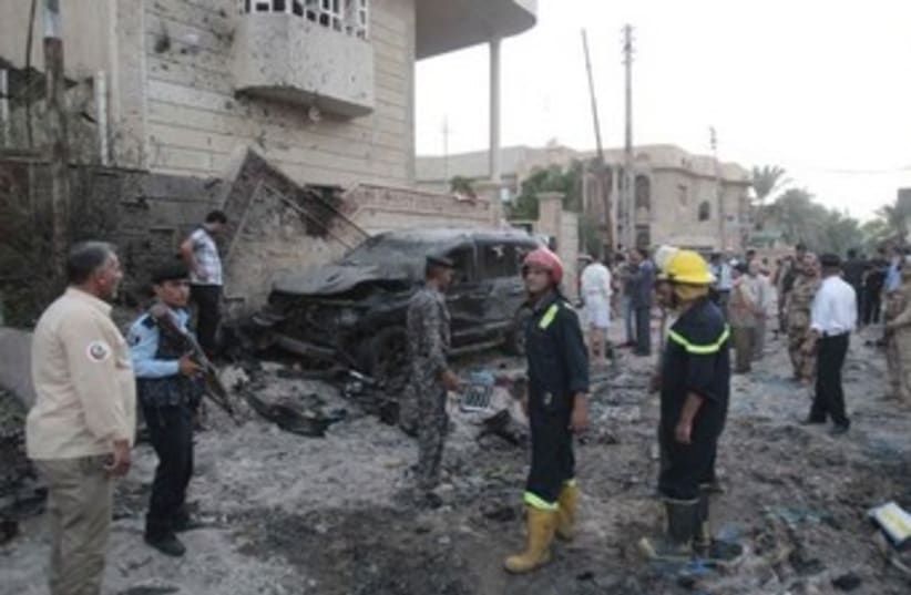 Carbombing attack in Iraq 370 (photo credit: REUTERS)