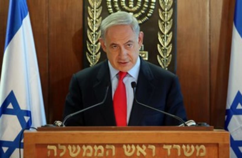 Netanyahu looking coy 370 (photo credit: Marc Israel Sellem/The Jerusalem Post)