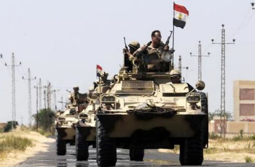 Egyptian soldiers move into El Arish, northern Sinai (photo credit: Reuters)