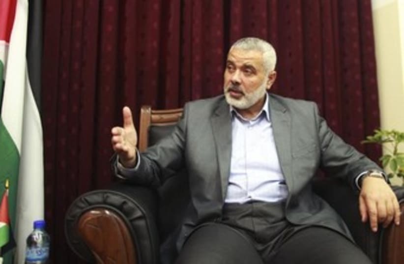 Ismail Haniyeh on a chair, looking expressive 370 (photo credit: REUTERS)