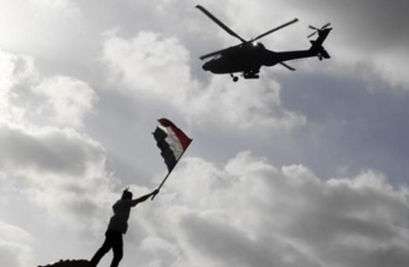 Egyptian army helicopter over Alexandria 370 (photo credit: REUTERS/Asmaa Waguih)