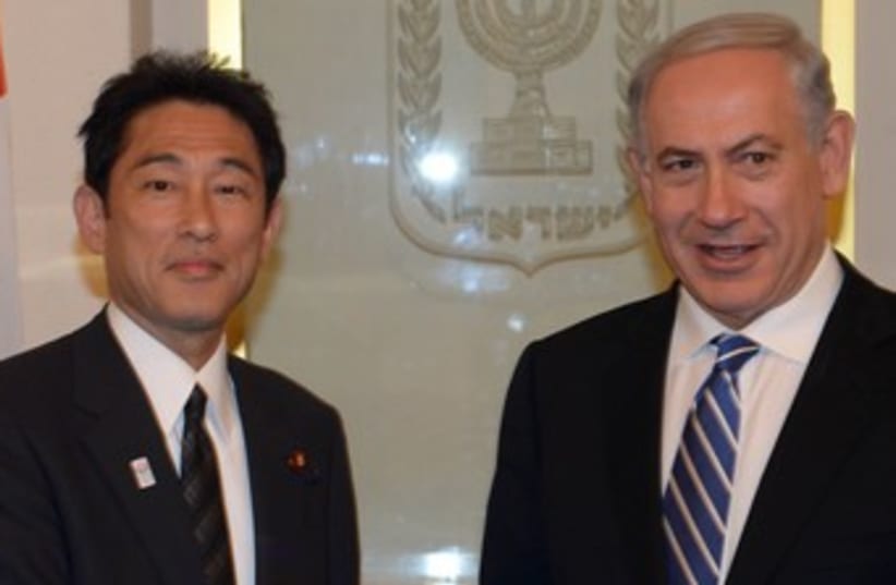 Netanyahu and Japanese Foreign Minister Fumio Kishida 370  (photo credit: GPO / Moshe Milner)