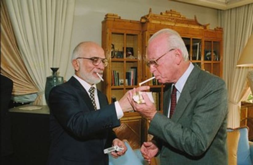 King Hussein, Yitzak Rabin share a ciggie 370 (photo credit: GPO)