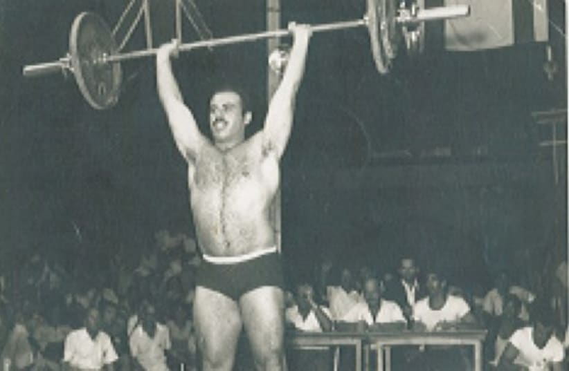Helman competing in the Maccabiah Olympics (photo credit: John Smith/ Wikimedia Commons)