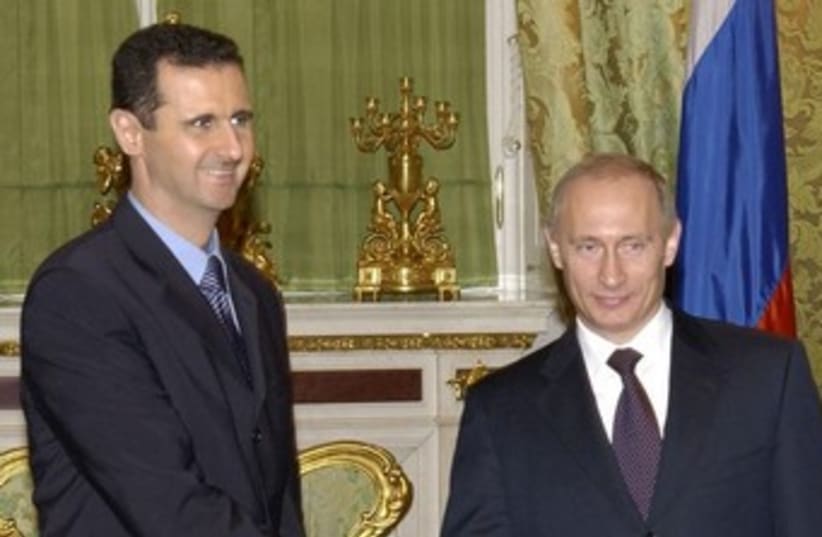 Bashar Assad and Vladimir Putin 370 (photo credit: REUTERS)