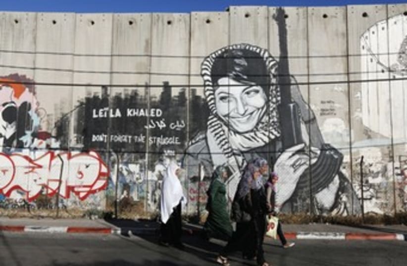 graffiti of freed Palestinian terrorist Leila Khaled 370 (photo credit: REUTERS)