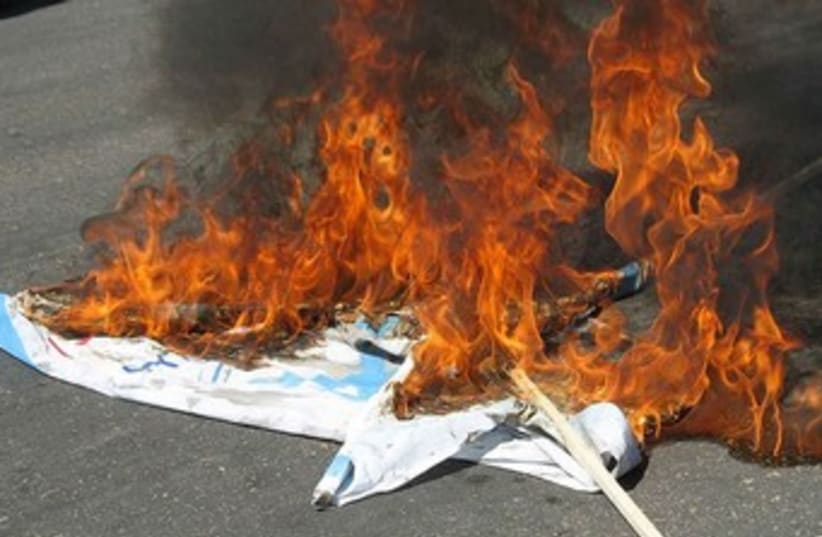 Al-Quds day Israel flag on fire in Iran 370 (photo credit: Wikimedia Commons)