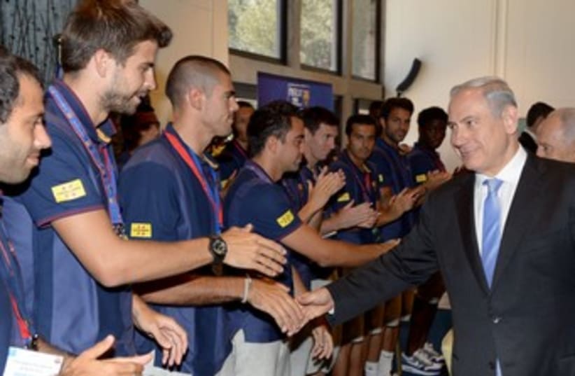 Prime Minister Binyamin Netanyahu greets FC Barcelona 37 150 (photo credit: GPO / Moshe Milner)