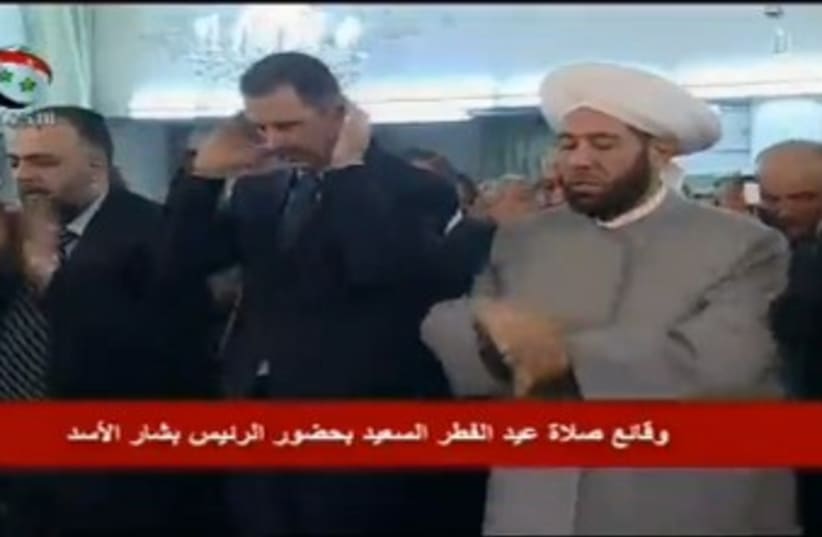 Assad attends Eid al-Fitr prayers 370 (photo credit: Syrian State Television)