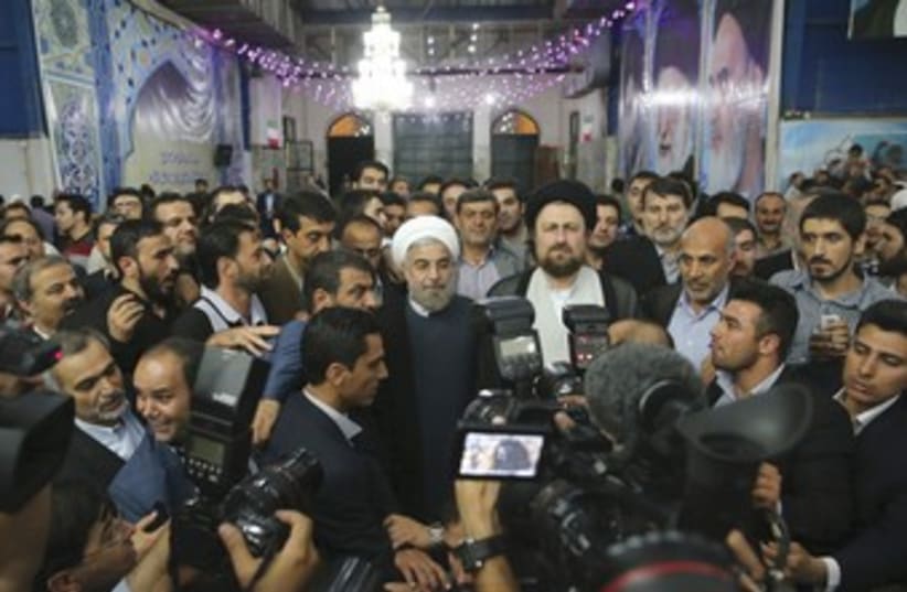 Rouhani in crowd 370 (photo credit: REUTERS)