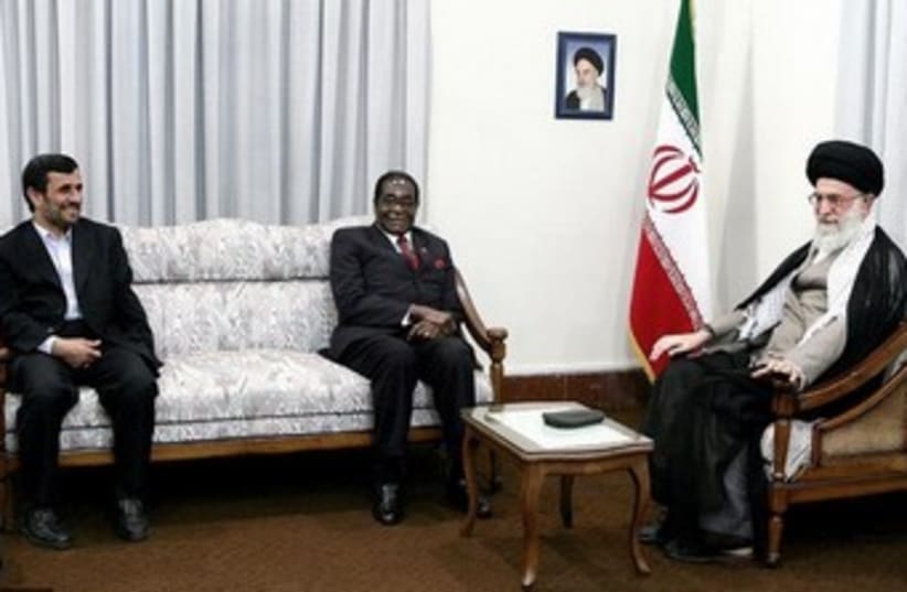 Iran's Khamenei hosts Zimbabwean President Robert Mugabe in  (photo credit: REUTERS)