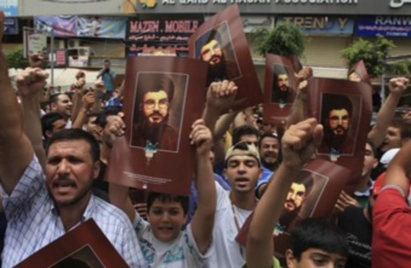Supporters of Lebanon's Hezbollah leader Sayyed Hassan Nasra (photo credit: Reuters)