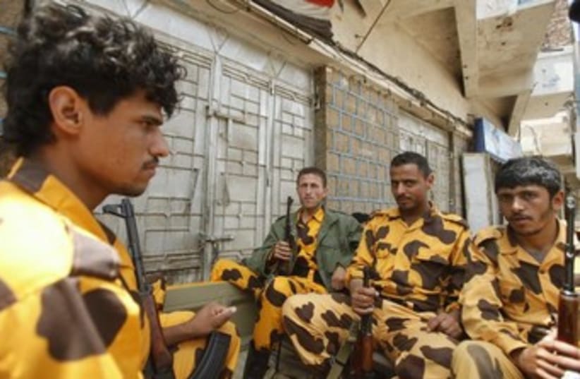 yemen policemen 370 (photo credit: REUTERS)