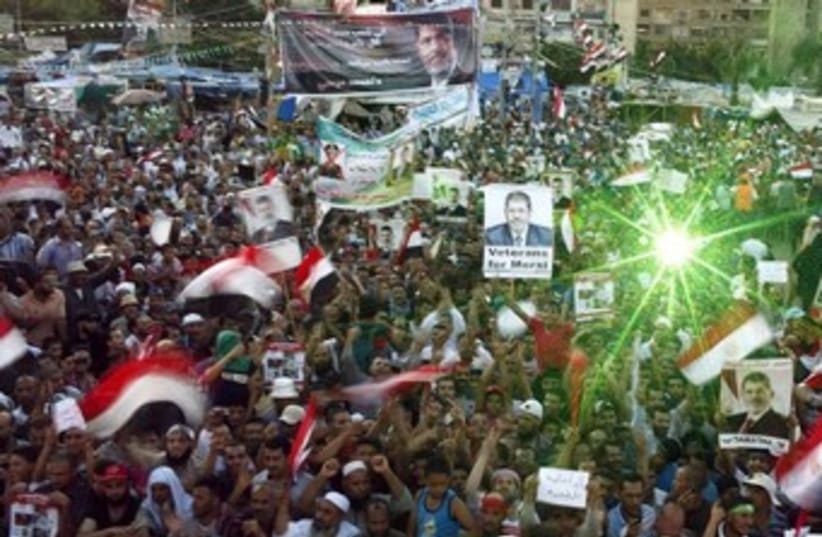 Pro Morsi supporters at Rabaa Adawiya Square 370 (photo credit: REUTERS/Asmaa Waguih)
