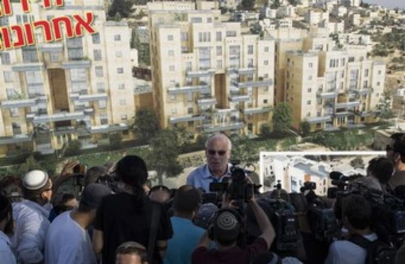 Uri Ariel speaking to reporters 370 (photo credit: REUTERS/Ronen Zvulun)