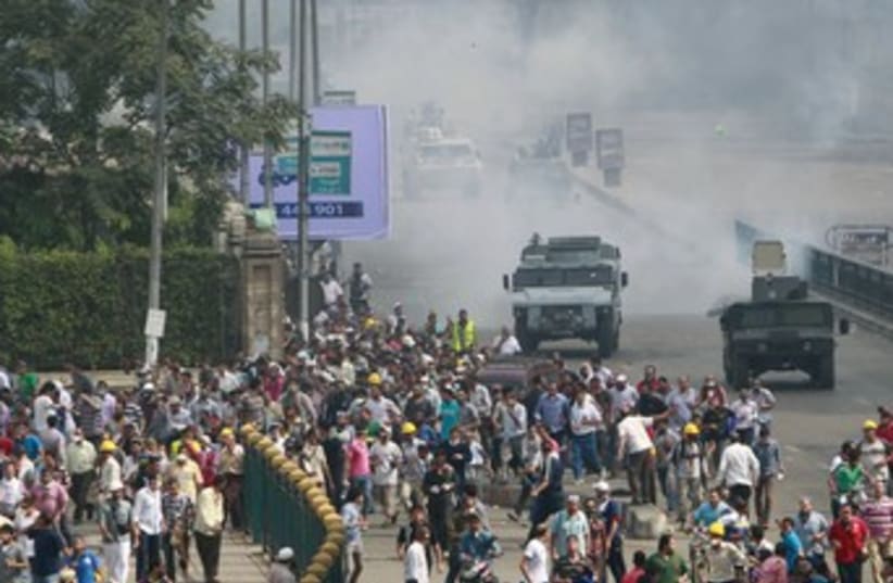 Protests near Cairo University 370 (photo credit: REUTERS)