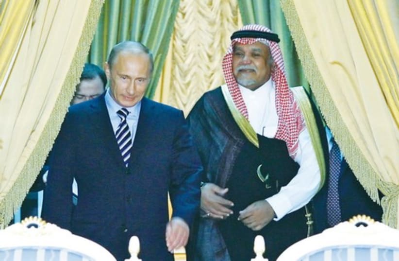 Saudi prince bin Sultan and Putin (photo credit: REUTERS)