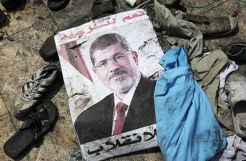 A poster of deposed Egyptian President Mohamed Morsi 370 (photo credit: REUTERS/Mohamed Abd El Ghany )