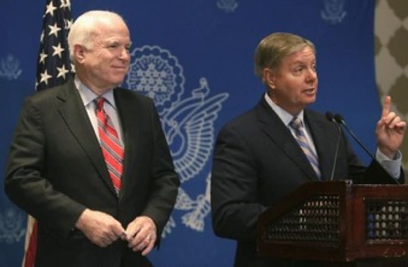 US senators John McCain and Lindsey Graham in Cairo 370 (photo credit: REUTERS/Asmaa Waguih)