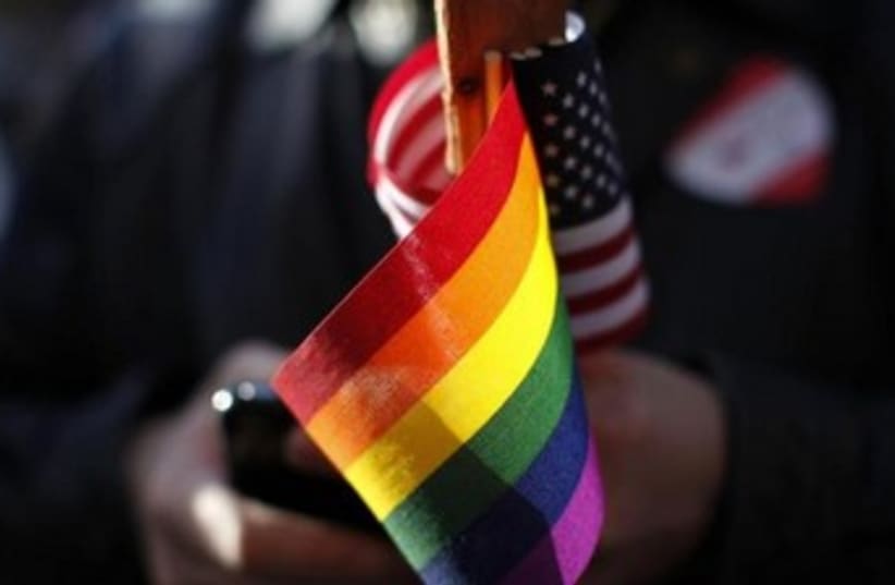 Gay pride and American flags 370 (photo credit: REUTERS/Stephen Lam)