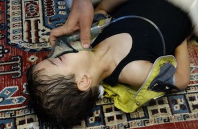 Boy allegedly affected by chemical weapons in Syria 370 (photo credit: REUTERS)