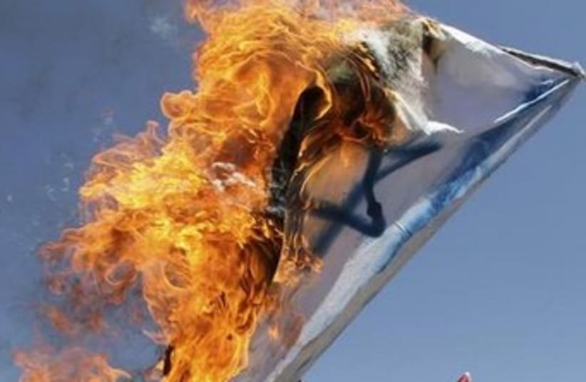 Burning Israeli flag 370 (photo credit: reuters)