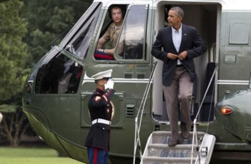 President Obama deplanes Marine One in Washington 370 (photo credit: Reuters)