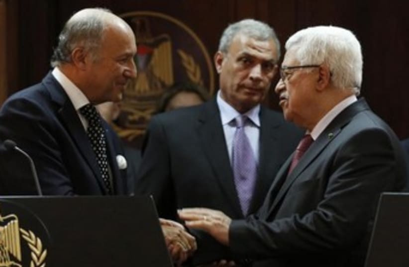 Abbas with French FM Fabius 370 (photo credit: REUTERS/Mohamad Torokman)