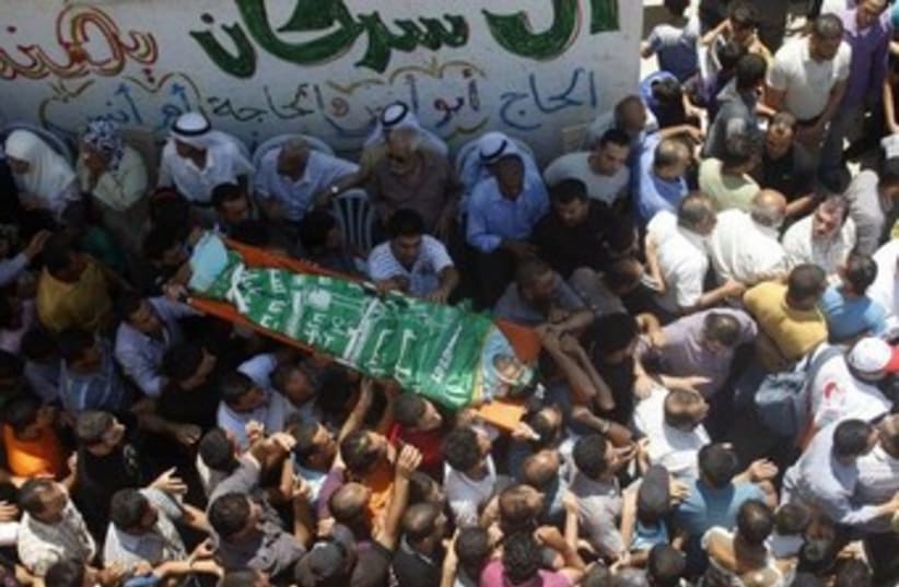 Ibrahim Sarhan Palestinains body Nablus raid funeral 370 (photo credit: Reuters)