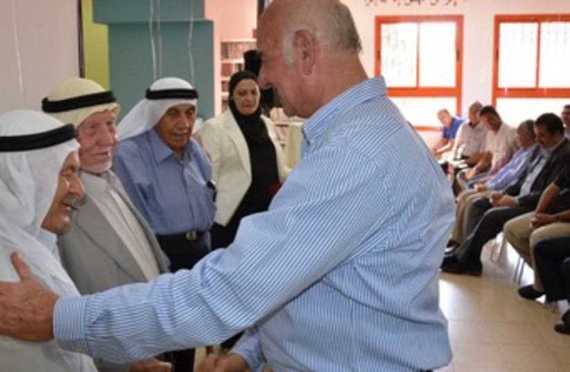 Minister Yaakov Peri with Baka al-Gharbia residents370 (photo credit: Courtesy of the Science Ministry)