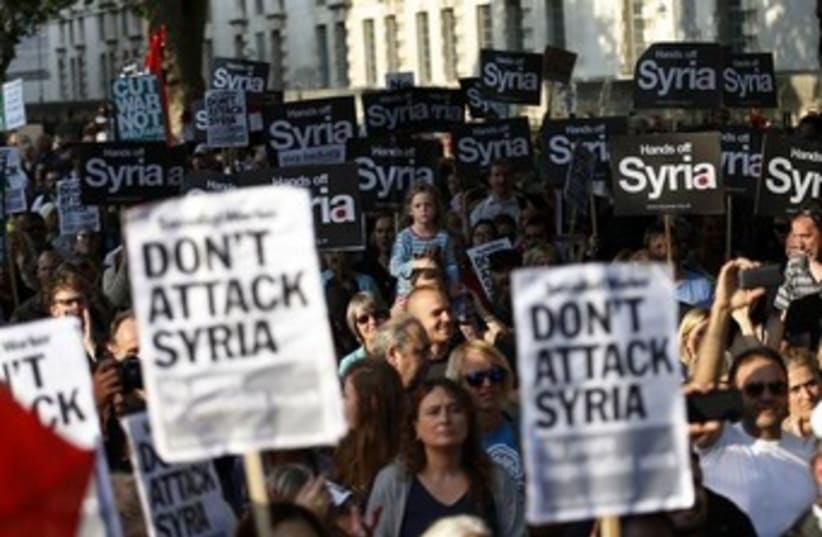 Protest against Syria in London 370 (photo credit: REUTERS/Olivia Harris )