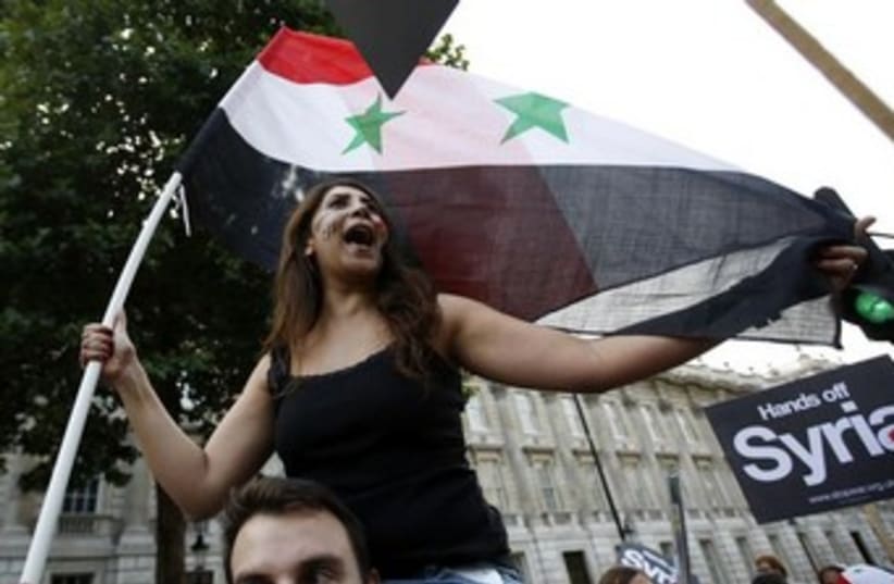 Protest against Syria attack in London 370 (photo credit: REUTERS/Olivia Harris )