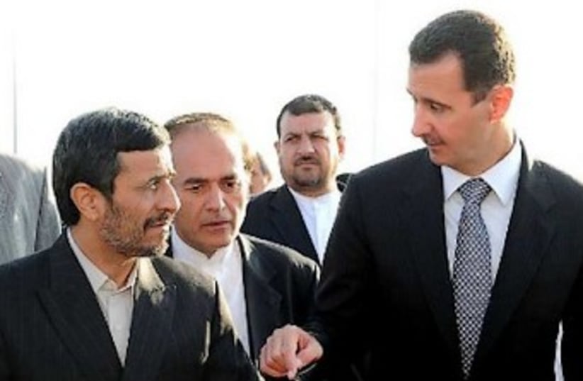 Ahmadinejad Assad Damascus 370 (photo credit: Reuters)