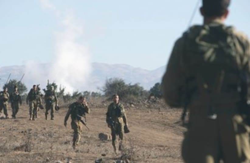 IDF trains on Golan Heights 370 (photo credit: REUTERS)