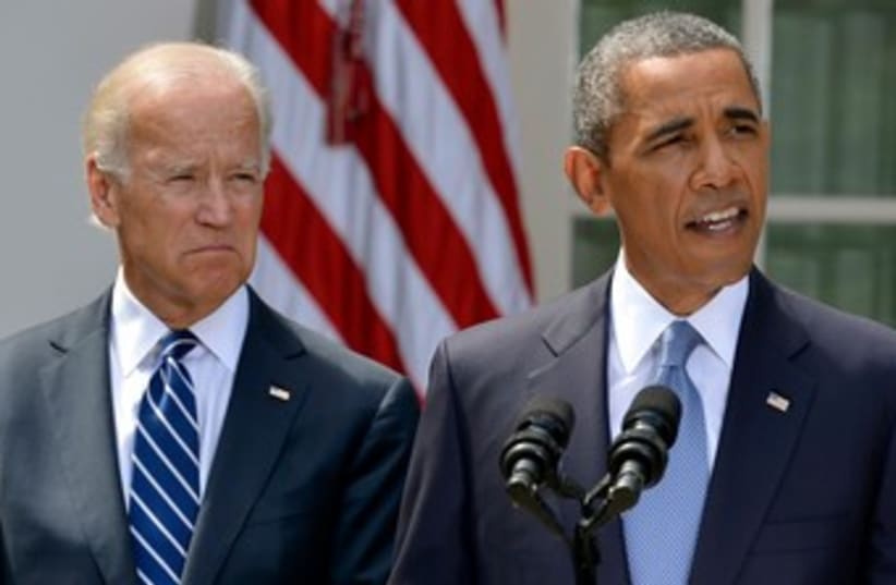 Obama Biden talking Syria white house  31.8.13 370 (photo credit: Reuters)