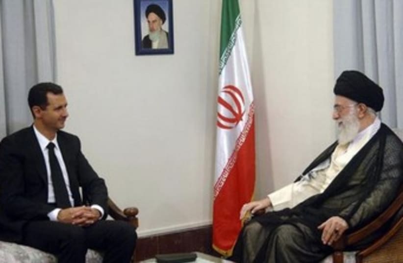 Bashar Assad and Ayatollah Ali Khamenei 370 (photo credit: REUTERS/leader.ir/Handout)