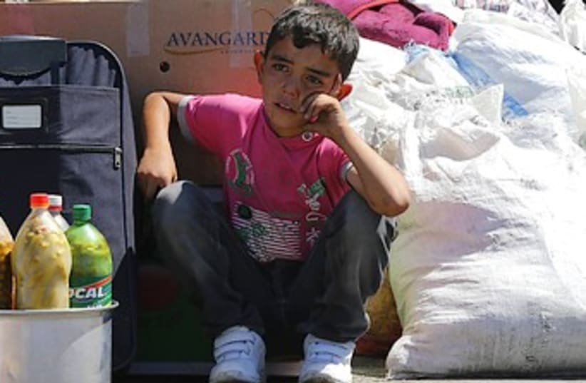 Syrian child refugee in Turkey 370 (photo credit: Reuters)