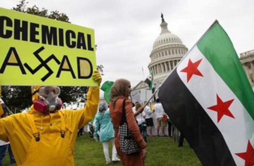 Anti-Assad protesters in Washington 370 (photo credit: REUTERS)