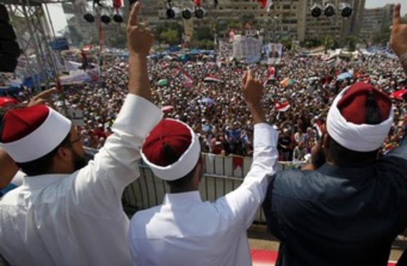 Clerics supporting deposed Egyptian President Mohamed Morsi (photo credit: REUTERS)