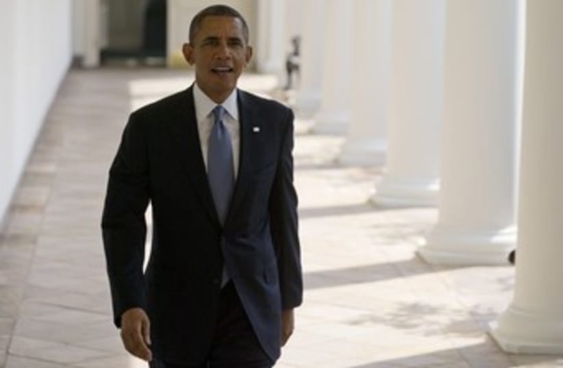 obama walking in white house 370 (photo credit: REUTERS)