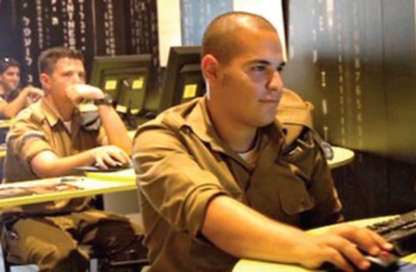 idf soldiers at computer 370 (photo credit: REUTERS)