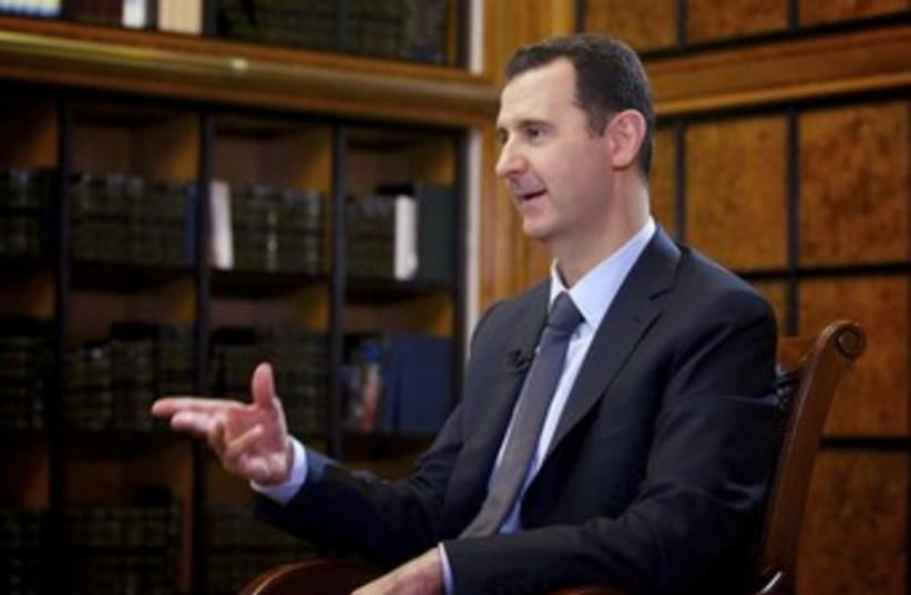 Bashar Assad gives an interview to Russian TV 370 (photo credit: Reuters)