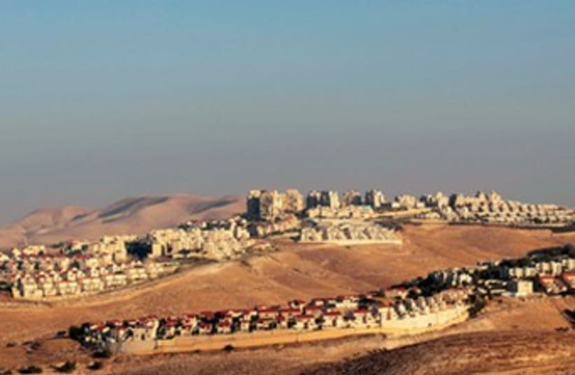 The basic error is to treat all the settlements alike (photo credit: AMMAR AWAD / REUTERS)